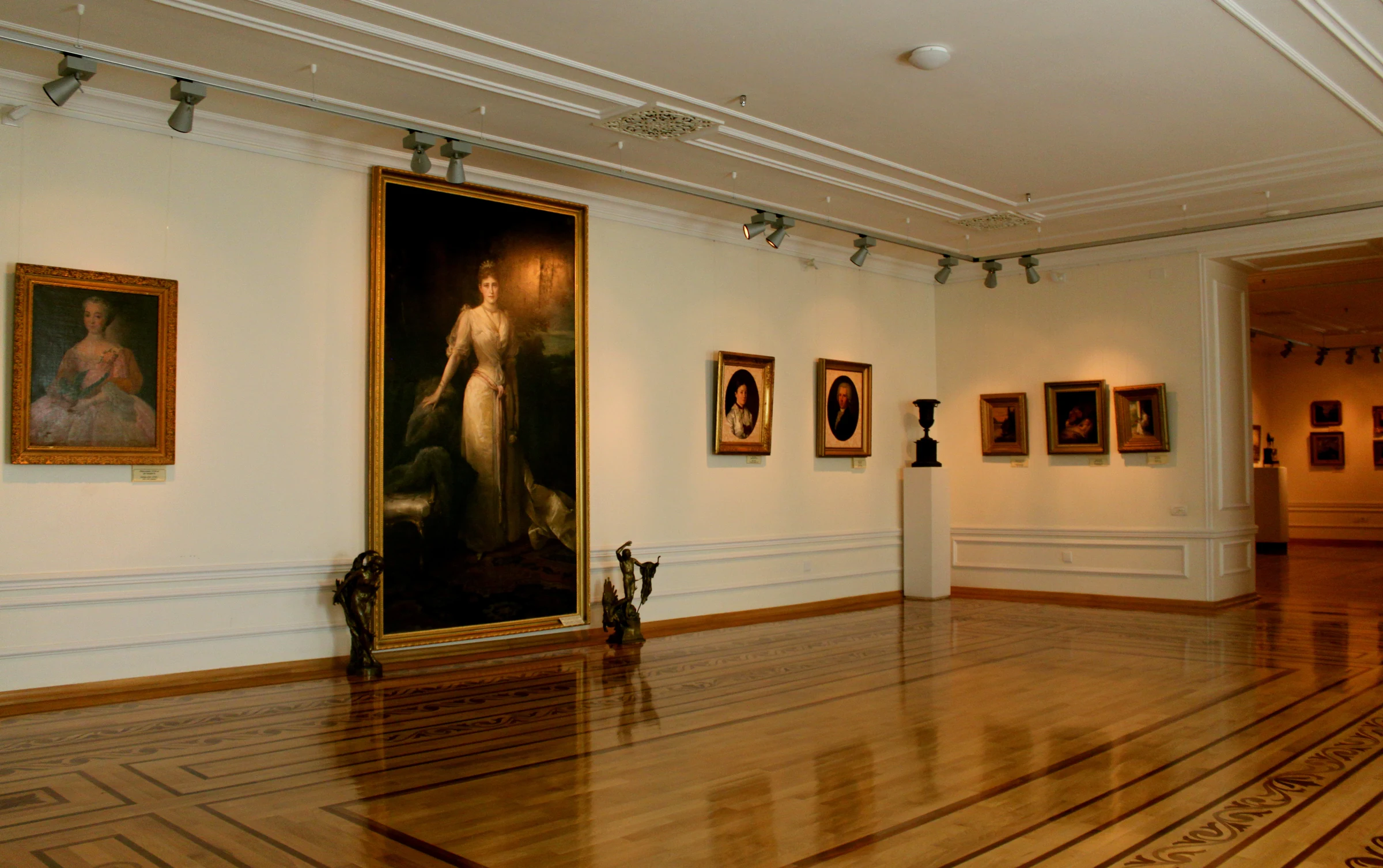 The German Art Hall at the National Art Museum of Azerbaijan, paintings hung symmetrically in a quiet gallery