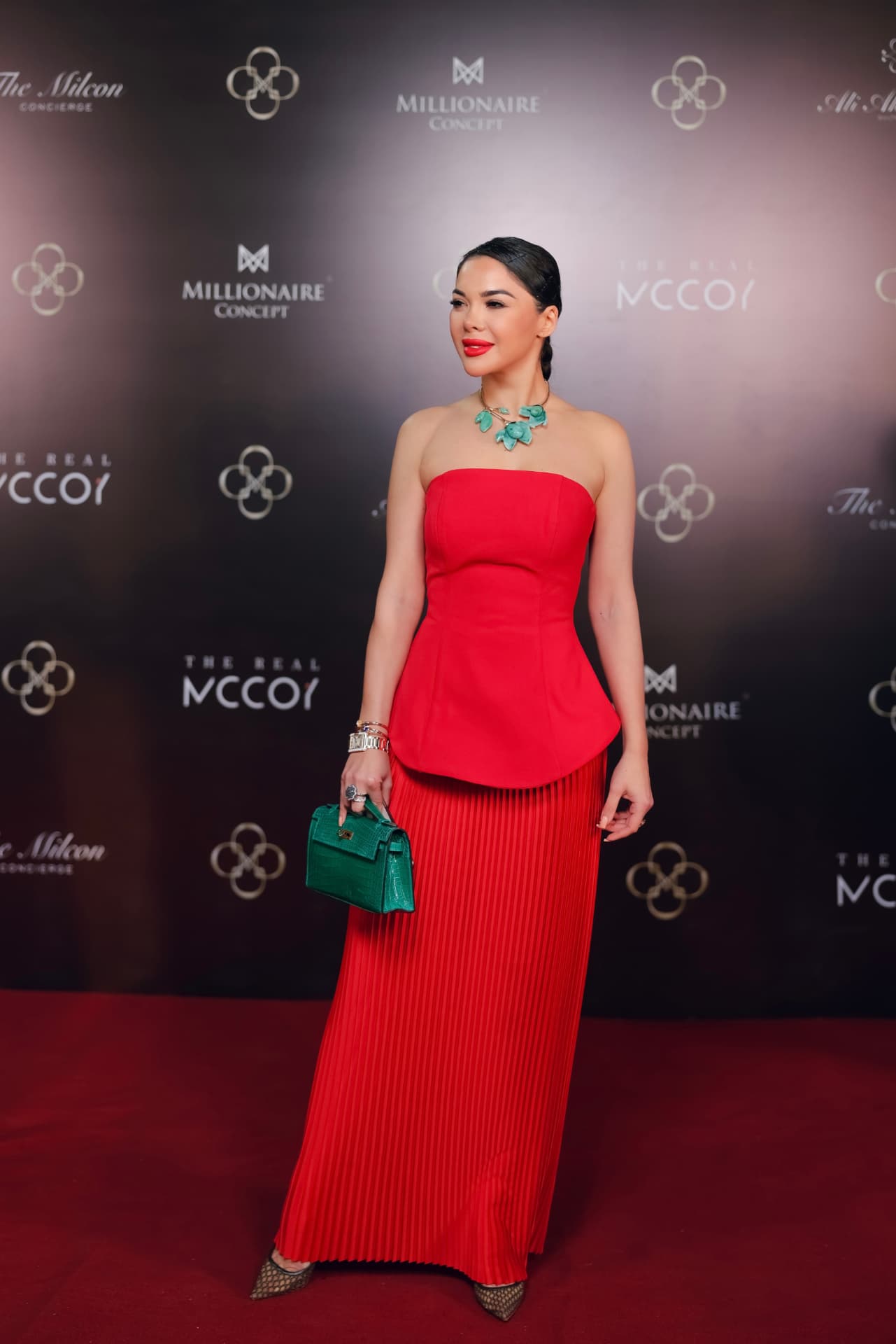Kamila Verdiyeva on the red carpet at a Millionaire Concept event