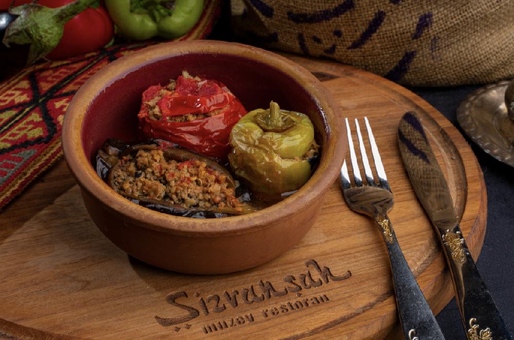 Tərəvəz dolması at Shirvanshah Museum Restaurant in Baku — stuffed eggplant, tomato and pepper.