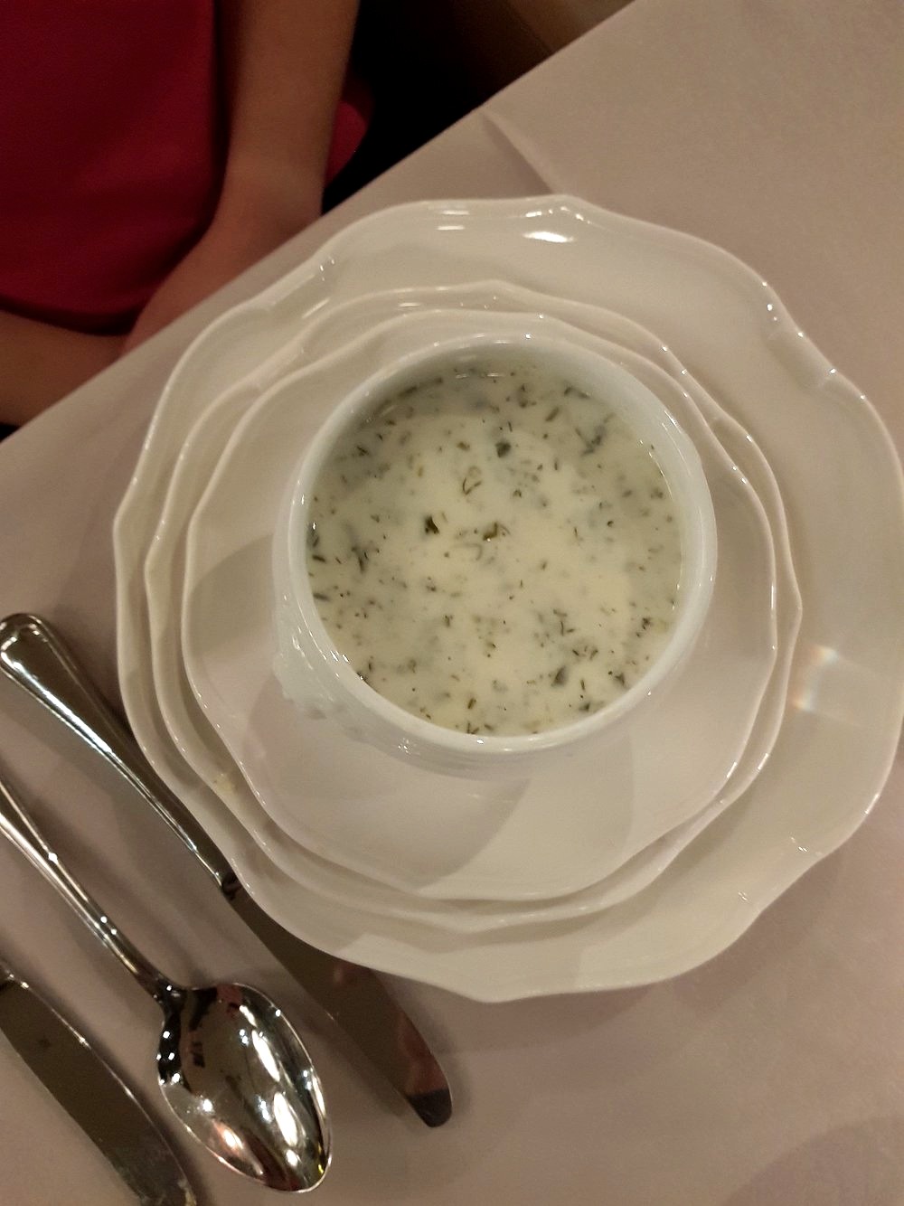 Dovğa — warm yoghurt and herb soup served in porcelain at Shur Jazz Hall in Baku