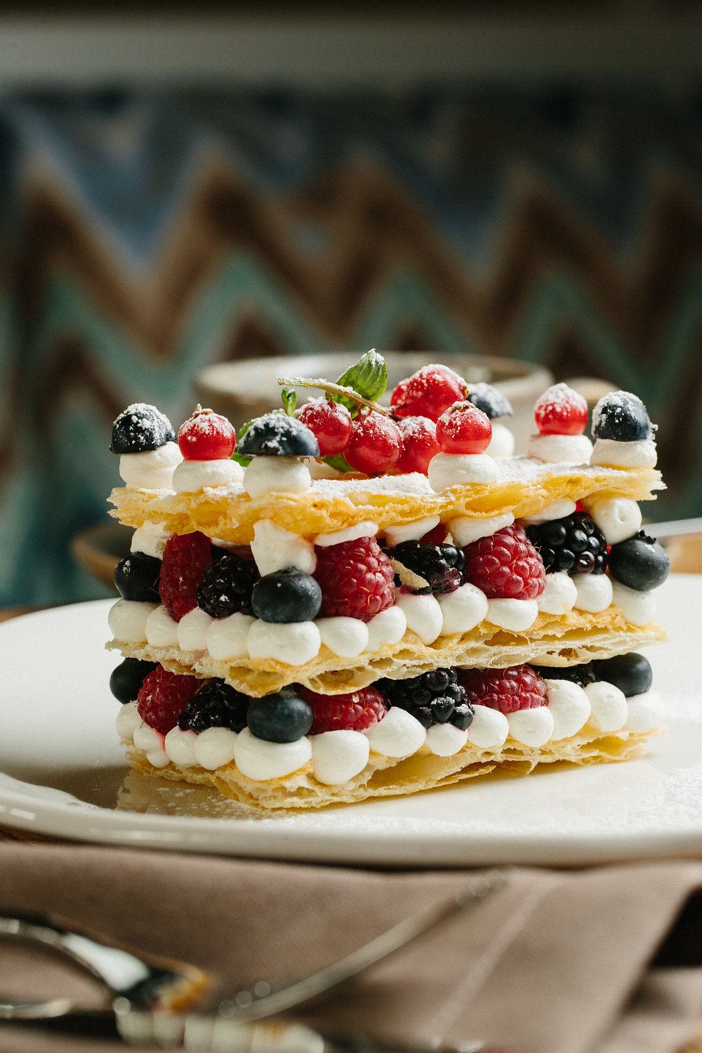 A berry millefeuille with cream and mint at Chayki in Baku